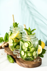 Detox infused water. Refreshing homemade cocktails summer drinks, selective focus. Summer refreshing beverage, drink with trendy zero waste accessories