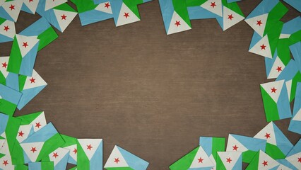 Frame made of paper flags of Djibouti arranged on wooden table. National celebration concept. 3D illustration