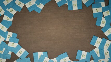 Frame made of paper flags of Guatemala arranged on wooden table. National celebration concept. 3D illustration