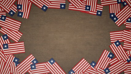 Obraz premium Frame made of paper flags of Liberia arranged on wooden table. National celebration concept. 3D illustration