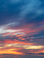 Naklejka na ściany i meble Sunset clouds colorful and building photo