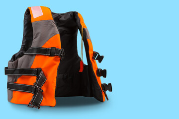 orange life jacket with gray inserts, on cyan background, concept