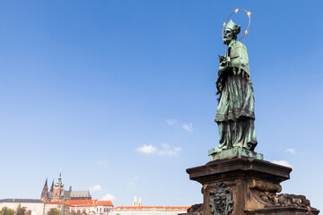 Obraz premium Patron Saint Nepomuk statue at the Charles Bridge, Prague