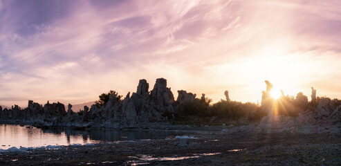Tufa towers rock formation in Mono Lake. Sunny Colorful Sunrise Art Render. Located in Lee Vining, California, United States of America. Nature Background.