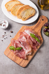 Closeup of thin slices of prosciutto. Italian food 