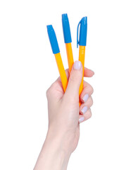 Pens in hand on white background isolation