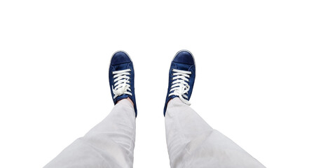 close up, top view of young man wearing denim sneakers and beige pants isolated on background with...