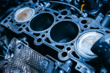 Repair of engine head and valves. Disassembled machine engine at modern auto service	
