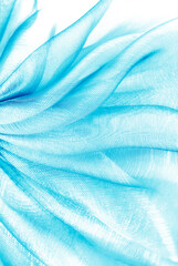 closeup of the wavy blue turquoise organza fabric