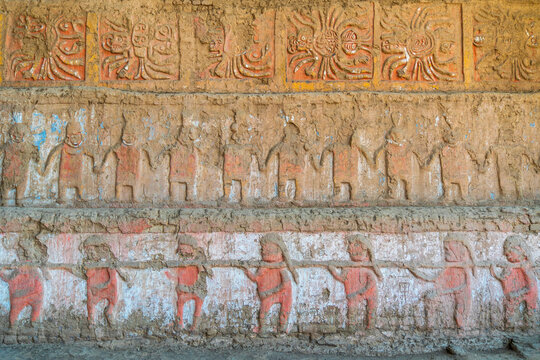 Ancient reliefs on the walls of the Moche Palace in Trujillo, Peru.