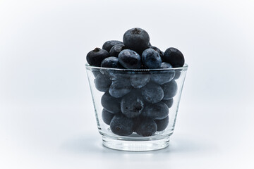 Blueberries in Glass on White