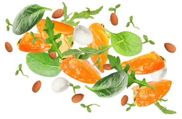 Tasty ingredients for persimmon salad flying on white background