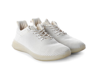 Pair of stylish sneakers on white background