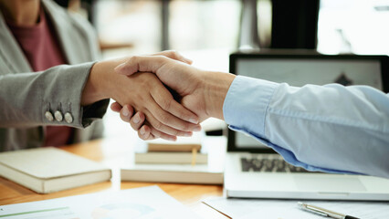 Teamwork executives colleagues business people handshake after meeting.