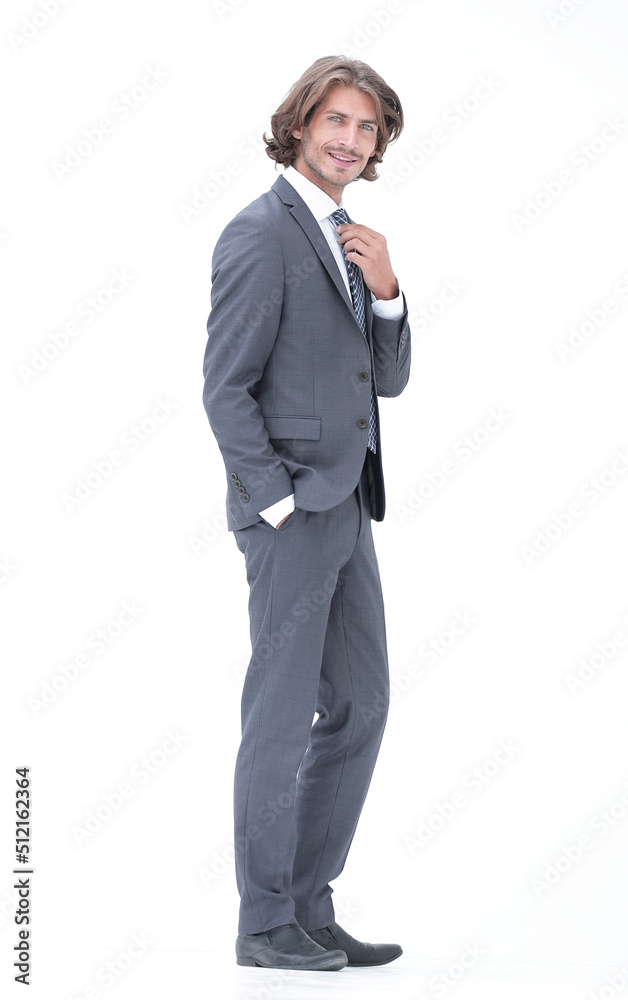 Canvas Prints businessman straightening his tie isolated on a white background