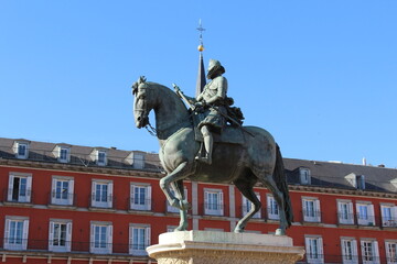 Plaza Mayor with statue of King Philip III in Madrid, Spain.