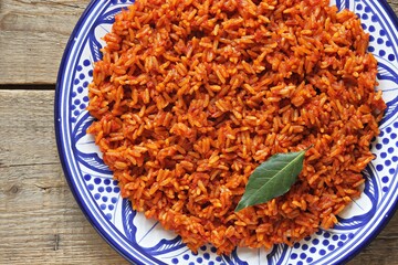 Jollof Rice. Traditional Nigerian spicy rice dish. National Jollof Rice day.