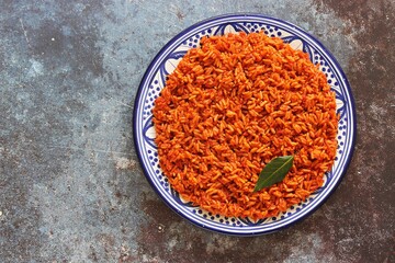 Jollof Rice. Traditional Nigerian spicy rice dish. National Jollof Rice day.