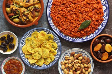 Jollof Rice. Potato Bhaja. Chicken Curry. Traditional African dishes. Flat layot