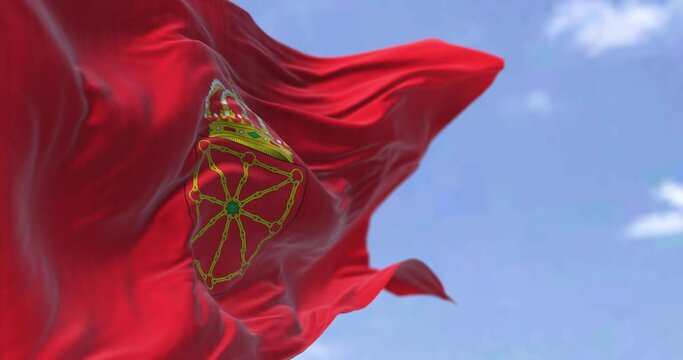 The Navarre flag waving in the wind on a clear day