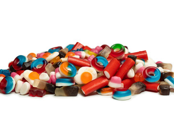 Tasty mix of jelly colorful candies isolated on a white background.