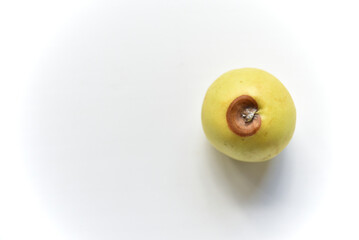 Rotten red and green apple on a white background