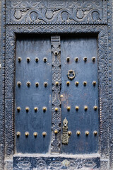 Traditional wooden door is a Stone town. Zanzibar, Tanzania