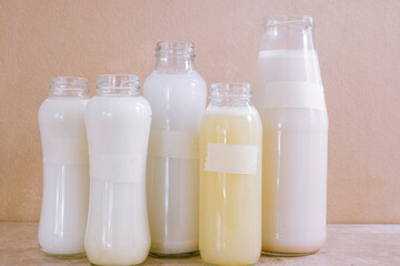 Homemade vegetable milk in glass bottles