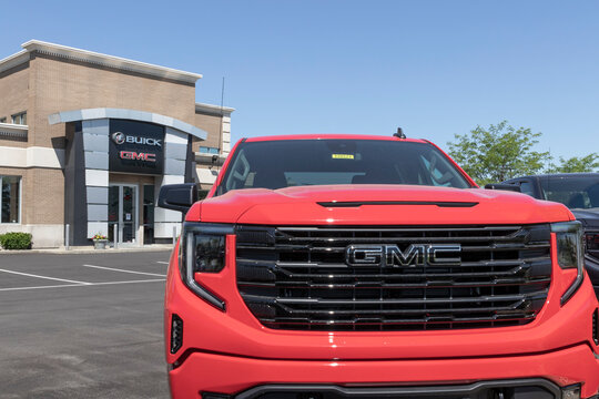 GMC Sierra 1500 pickup display at a dealership. GMC offers the Sierra in HD, HD Pro, AT4 and Denali models.