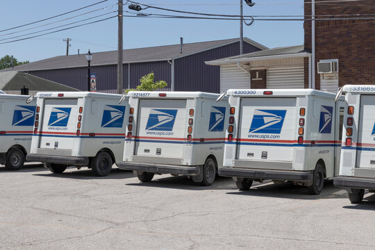 USPS Post Office Mail Trucks. The Post Office is responsible for providing mail delivery.