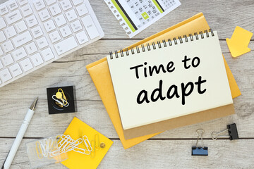 Office desk table with paper sheet, notepad ,chart and pen. Time to adapt