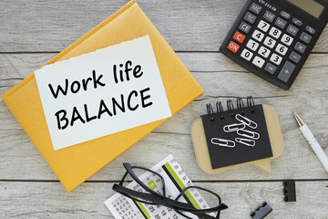 work life balance text on a yellow notepad on a torn page