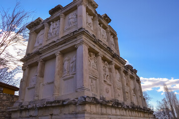 Fototapeta premium Relic decorated with historical symbols. Historical building from ancient times.