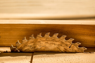 Sawmill close-up disc saw. Furniture production sawing parts for wooden furniture. Industrial plant.
