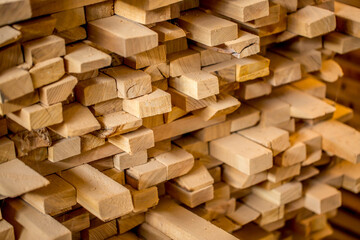 Warehouse wood closeup. At the sawmill plant wooden blanks for furniture and construction.