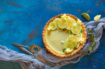 Appetizing beautiful lemon muffin in a light key, beautiful still life with a delicious cake on the table. Sweet delicacy in the pastry shop. lime dessert bakery products
