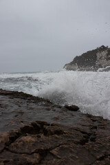 waves crashing on rocks