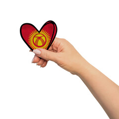 Woman hand is holding heart. Peace concept on white background. Kyrgyzstan