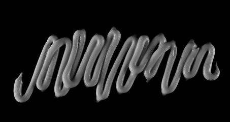 Body and face cream, white skincare product isolated on black, top view with clipping path