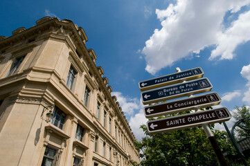 Street name signs in a city, Rue De La Cite, Paris, Ile-de-France, France