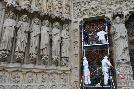 Restoration of the doors of a cathedral, Notre Dame, Paris, Ile-de-France, France