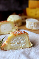 cheese board cheeses fresh goat sheep cheese, soft cheese meal food snack on wooden board selective focus