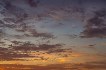 Fototapeta na wymiar Dramatic sunset sky, cloudscape with colorful twilight clouds 