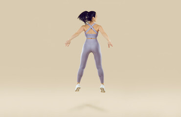 Fototapeta na wymiar Happy joyful woman in lilac activewear jumping in the studio with a beige background. View from behind of a cheerful energetic fit lady enjoying jumping exercises during her fitness workout at the gym