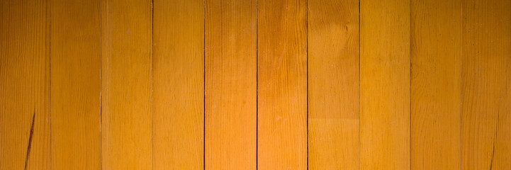 Panoramic old and scratched wooden floor. Pine texture painted with varnish