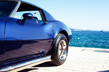 real old fashion cabriolet car at seaside touristic view lifestyle