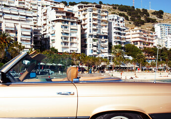 real old fashion cabriolet car at seaside touristic view lifestyle