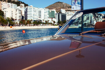real old fashion cabriolet car at seaside touristic view lifestyle