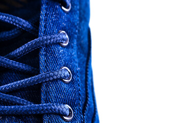 Shoe laces. Lace-up casual or sports shoes close-up on a white background. Shoes background
