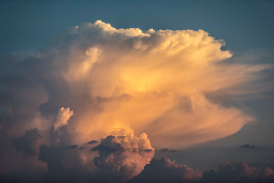 Cloud formation being hit by the setting sun, near Magnolia, Texas, USA